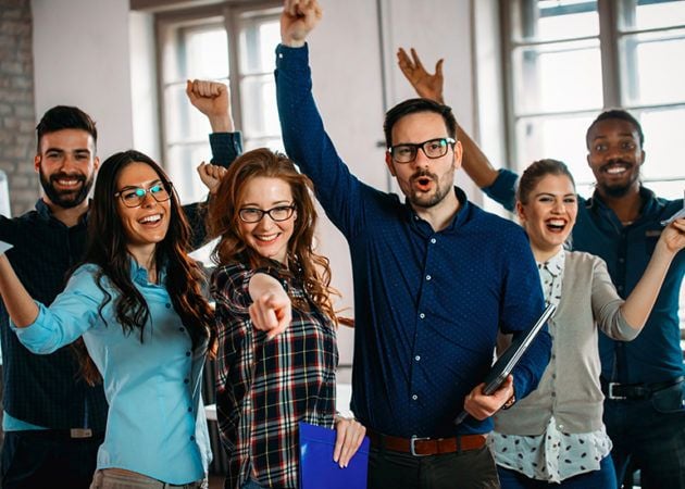 Happy employees celebrating