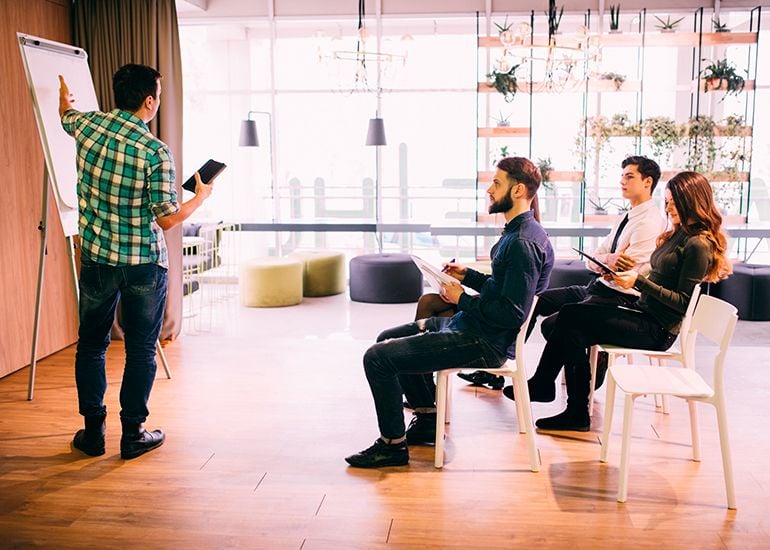 Business man pitching to potential investors