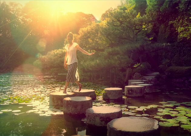 Stepping stones over garden pond