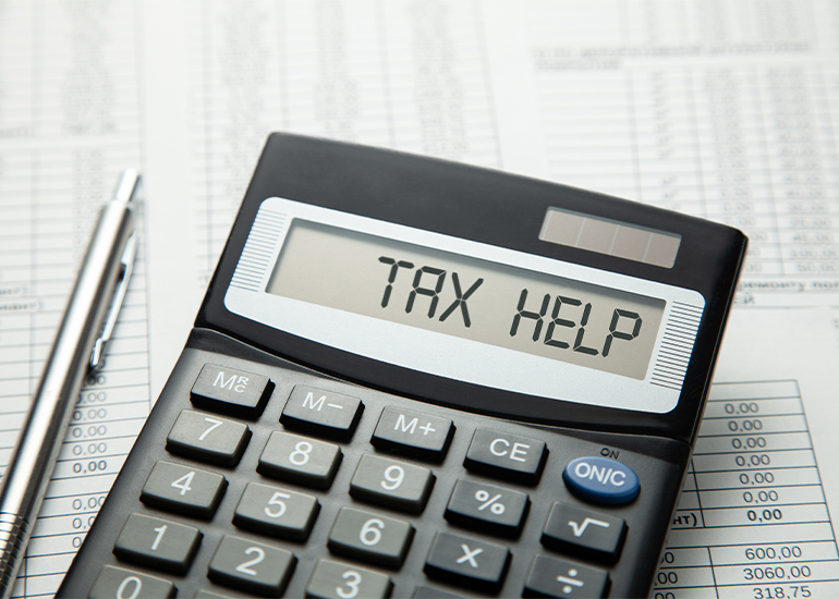 calculator showing the words 'tax help'