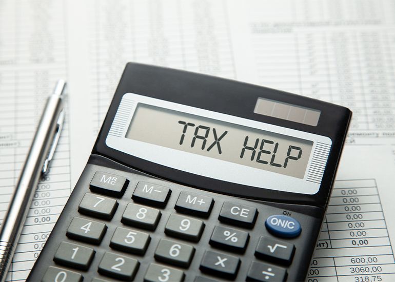 calculator showing the words 'tax help'