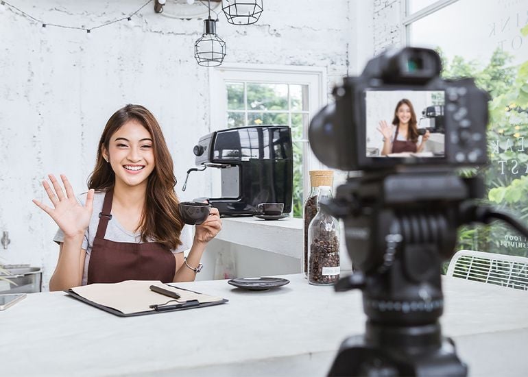 Woman creating social media video