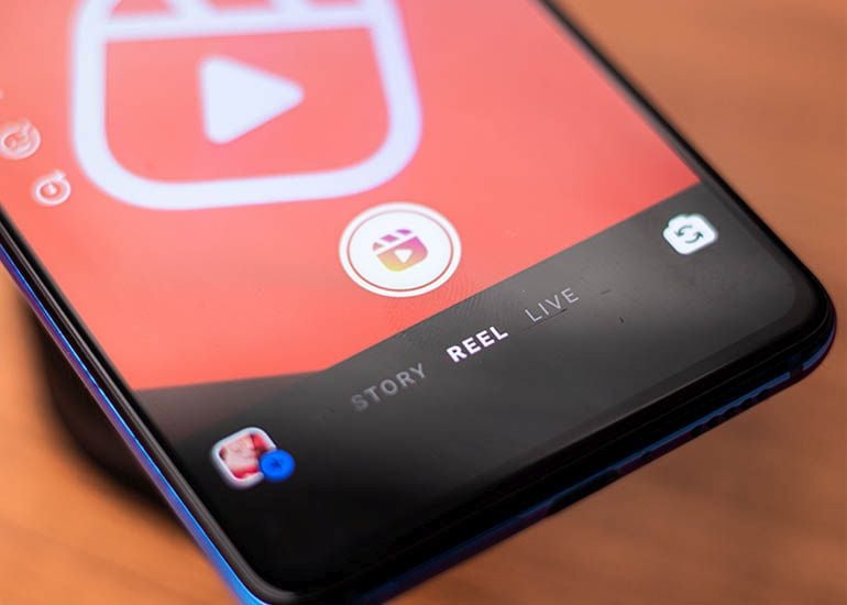 Smartphone showing Instagram Reels home screen