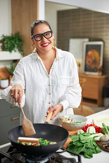 Marion Grasby cooking in kitchen