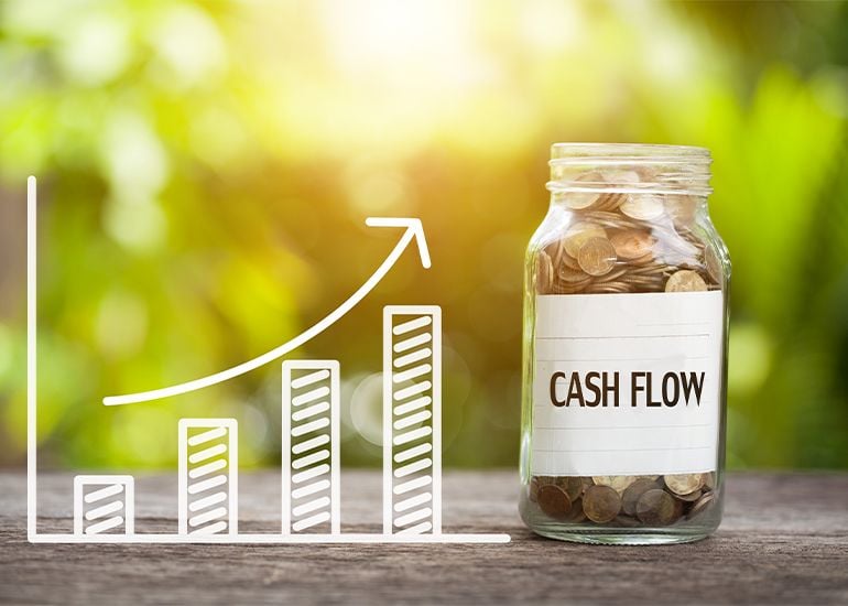 cash flow graph and money jar