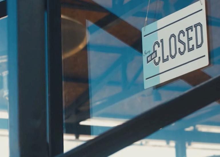 closed sign in shopfront window