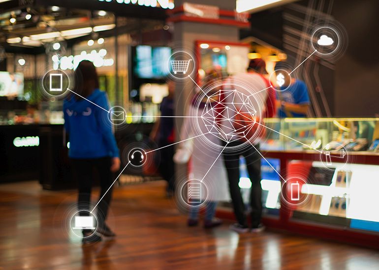 Customers in store with data graph overlaid on image