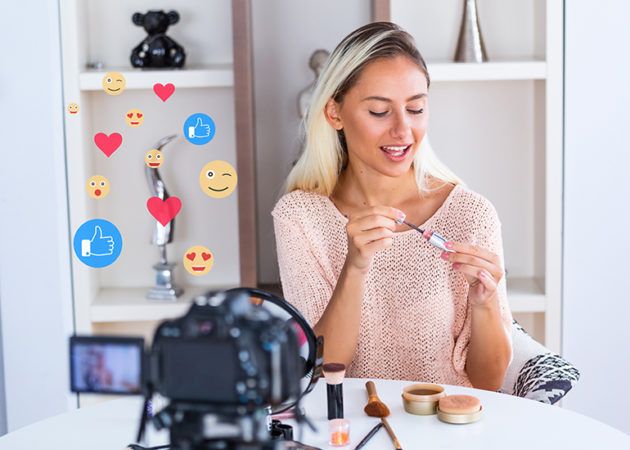 Social media influencer trying on makeup