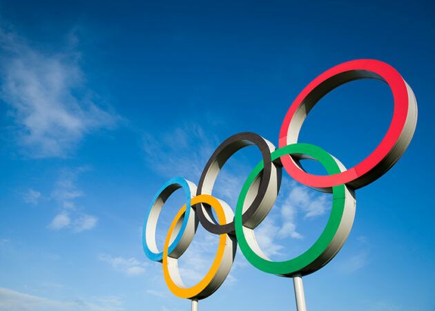 olympic rings on blue sky background