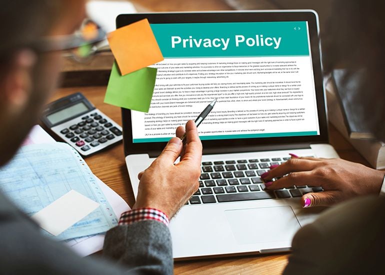 Privacy policy document on laptop screen