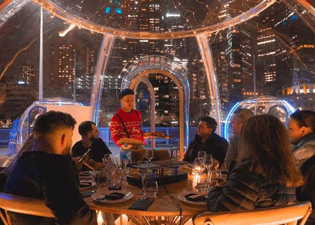 family and friends gather for cheese