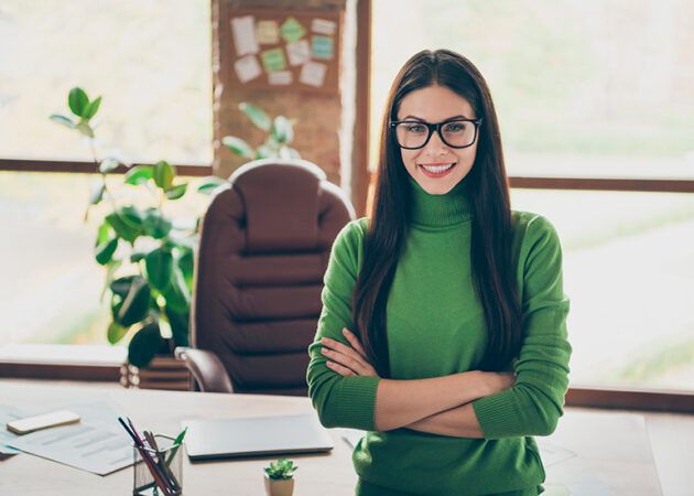 Young female executive in office
