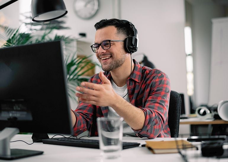 Man on video call working remotely
