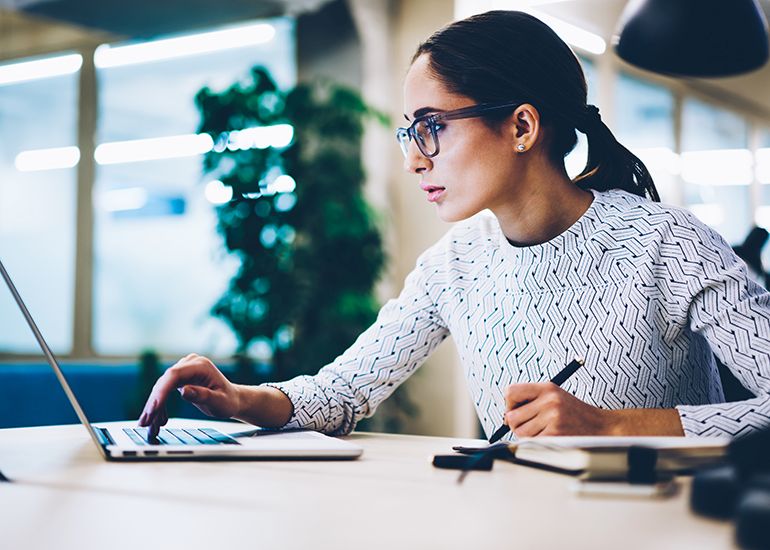 Woman working on business at desk