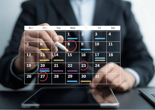 person looks at a virtual calendar.