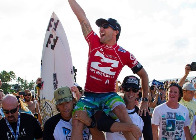 Joel Parkison celebrates a win hand raised.