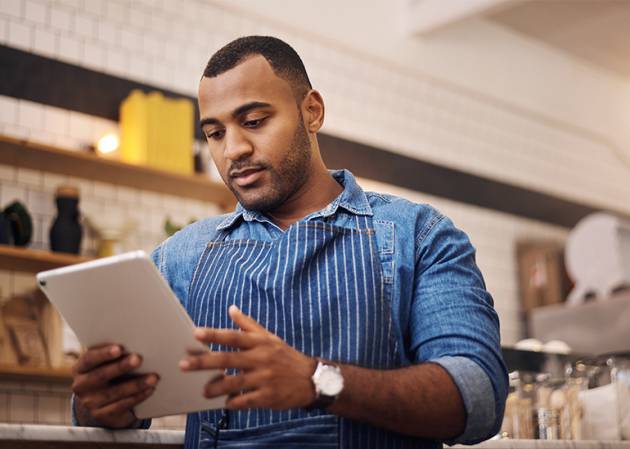 small business staff looking at iPad