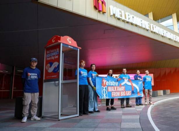 Greenpeace protesting outside Telstra AGM.